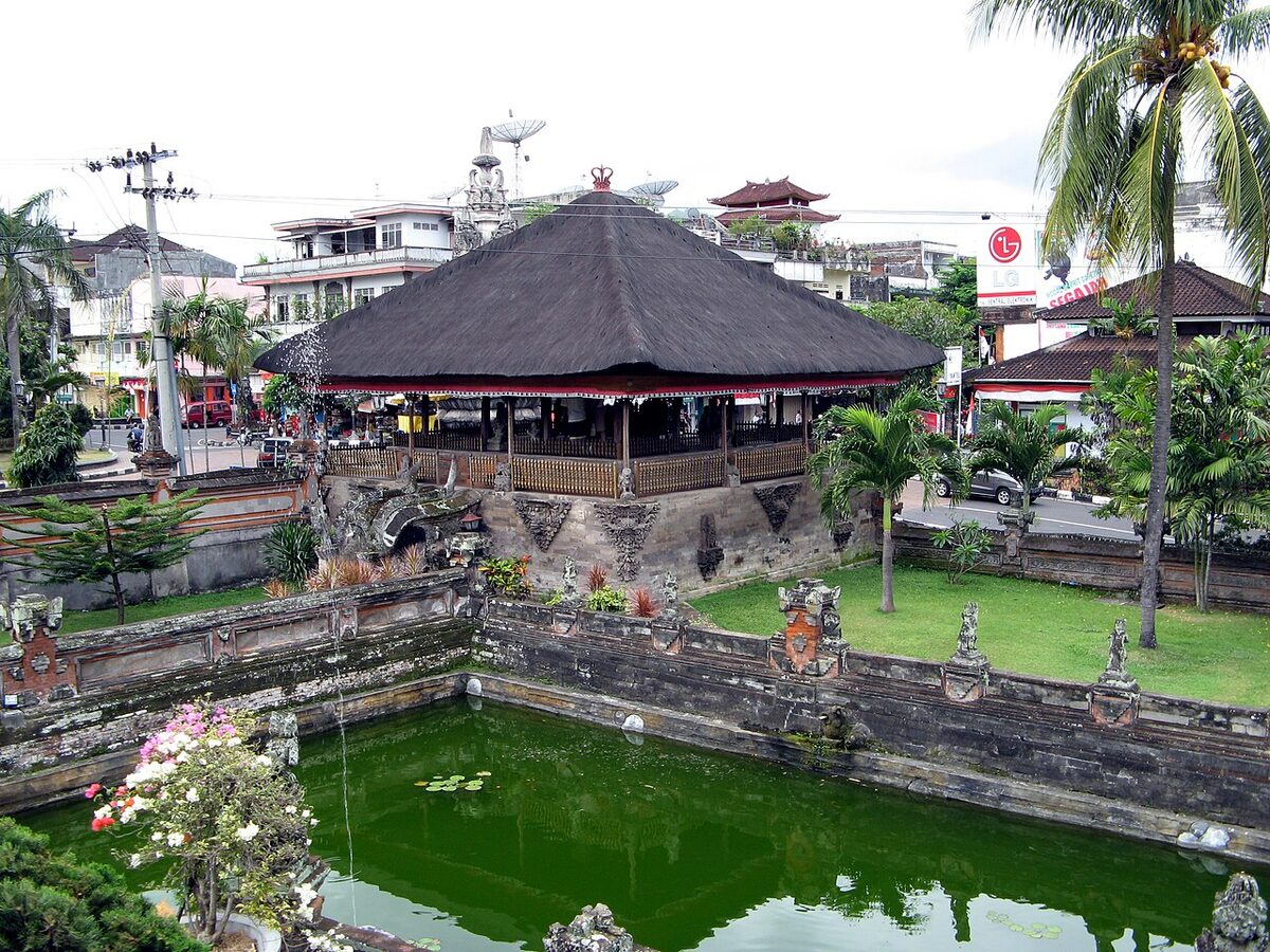 Bale Kambang in the Kerta Gosa complex (Taman Gili), Semarapura, surrounded by a pond.