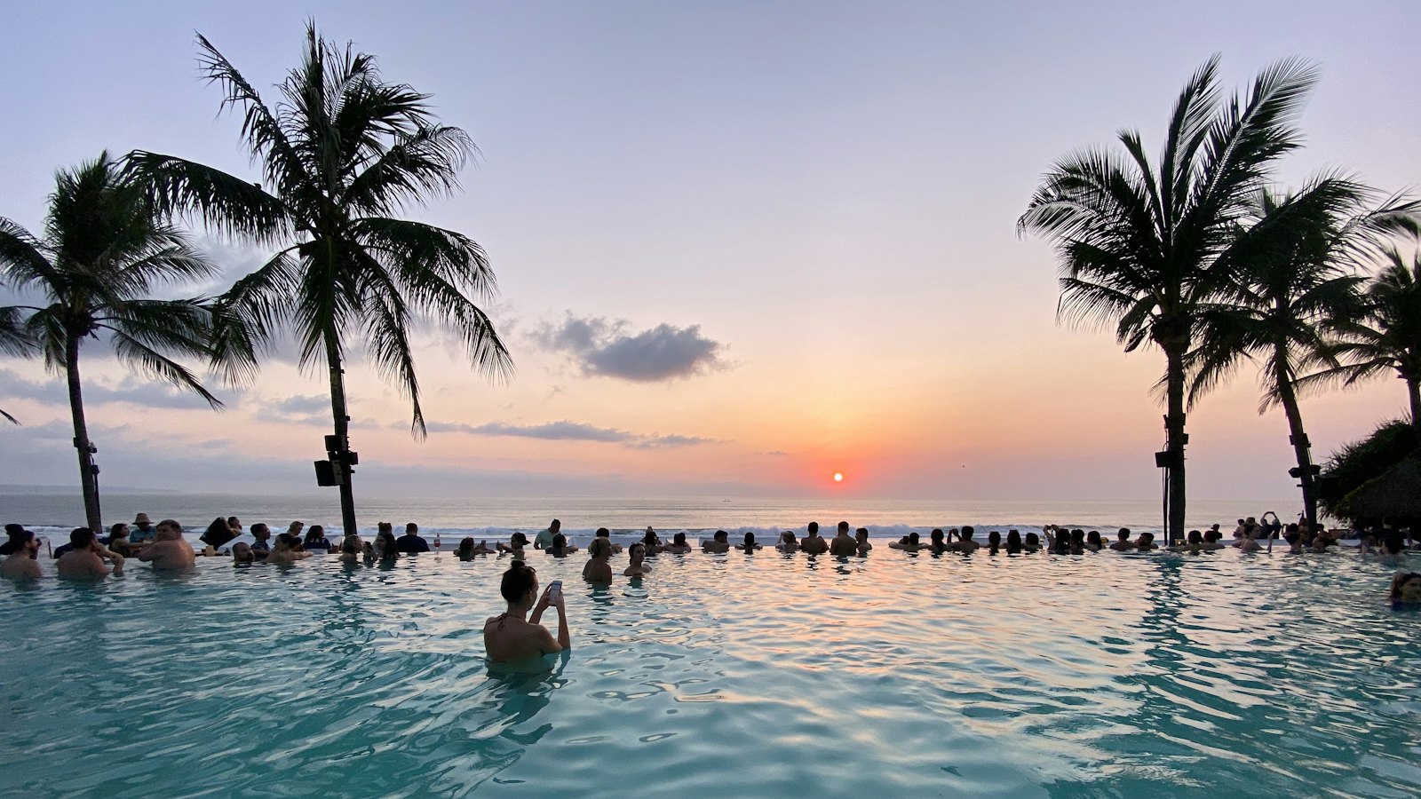 Beachfront pool at sunset in Seminyak
